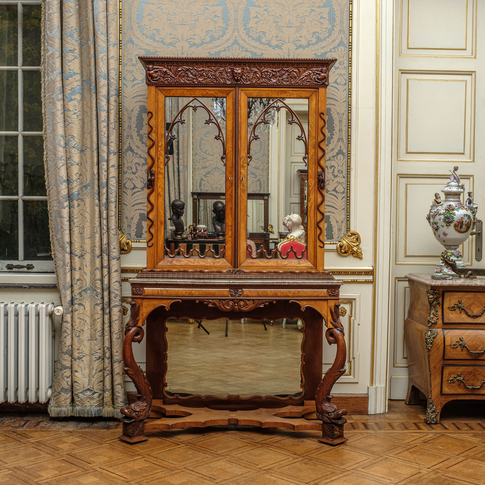 A Gothic Revival walnut and walnut veneered cabinet on foot with marble top, 19/20th C.