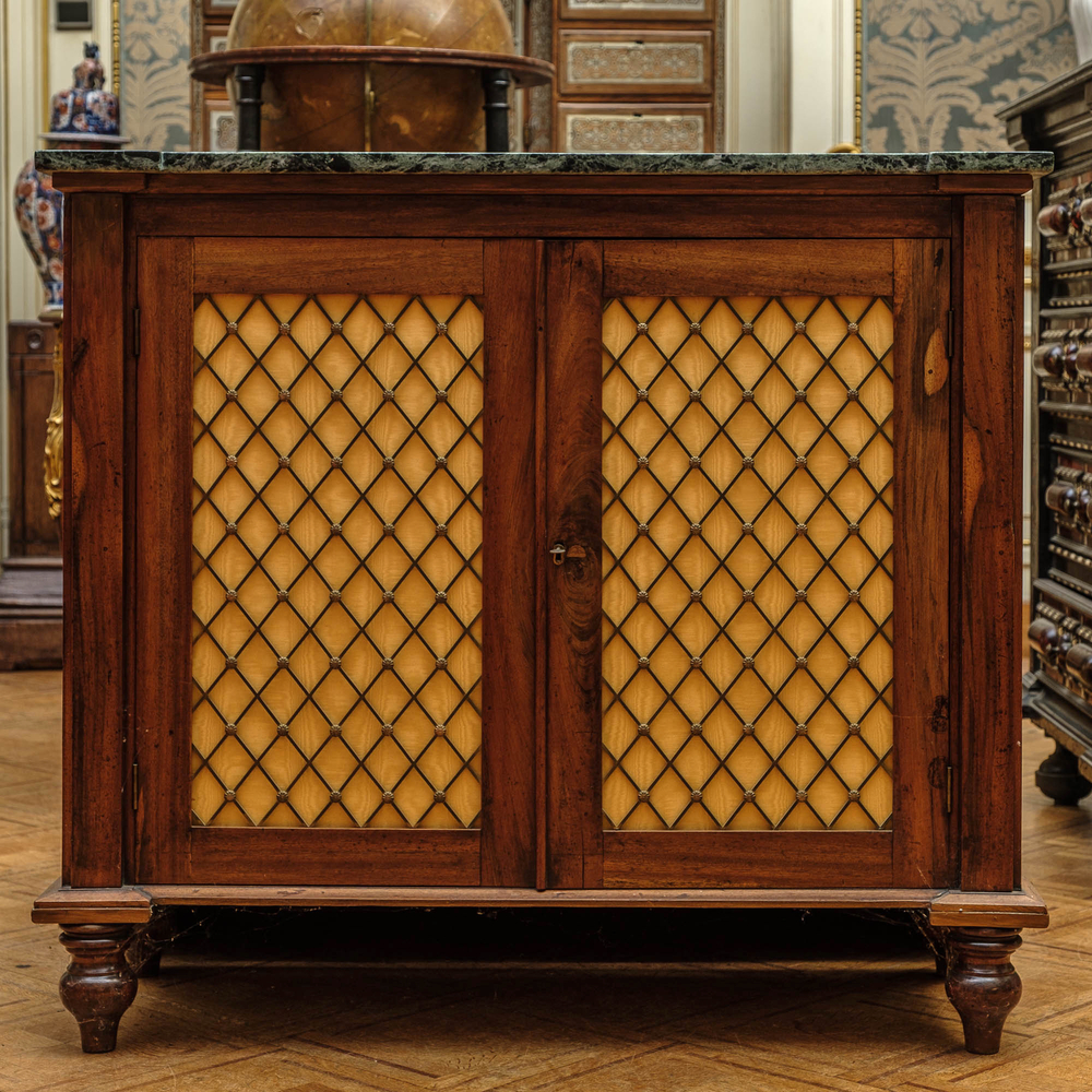 A mahogany low bookcase with a 'vert de mer' marble top, 19th C.