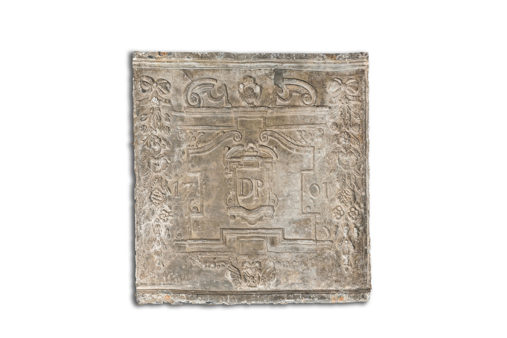 A lead fireplace plaque with the monogram DP and dated 1701