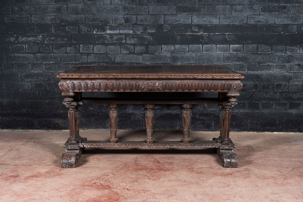 A French walnut table in Henri II-style