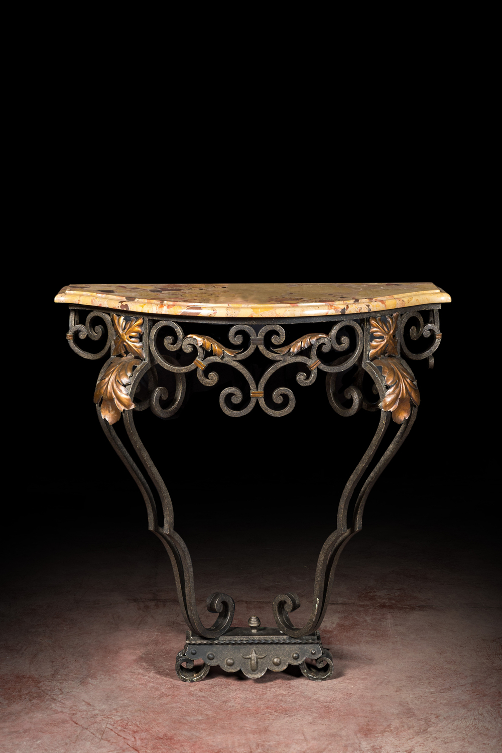 A wrought iron console with marble top, 20th C.