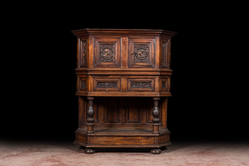 A walnut 'credence' case with portrait medallions, probably France, late 17th C. with later elements