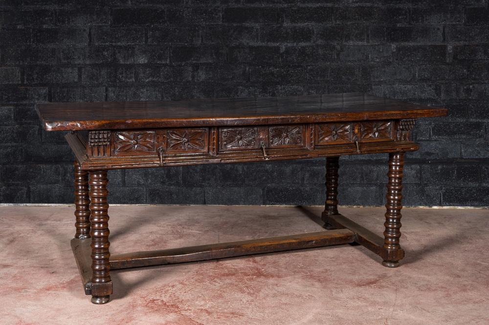 A Spanish walnut table with three drawers, 17th C