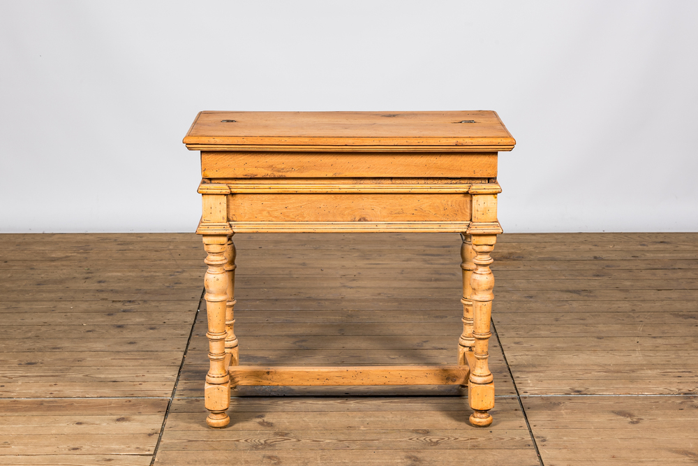 A bleached oak wooden desk, 20th C.