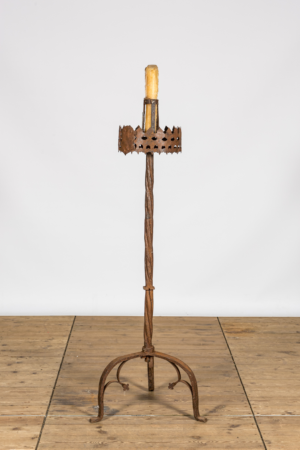 A twisted Gothic Revival wrought iron church candlestick, 19/20th C.