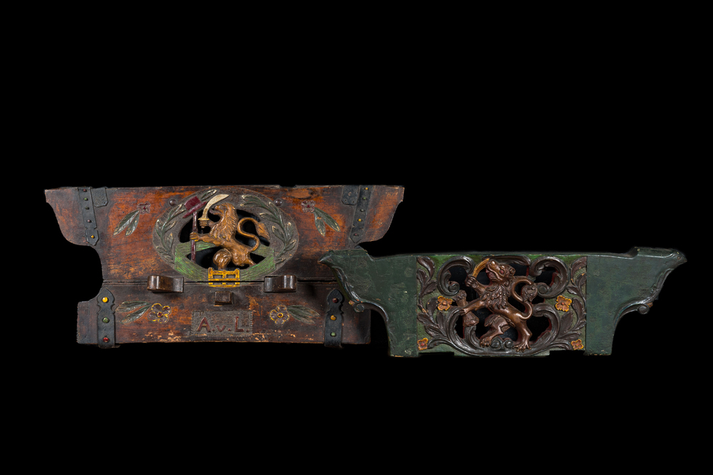 Two Dutch polychrome wooden sheafs of farm wagons with a lion, 19th C.