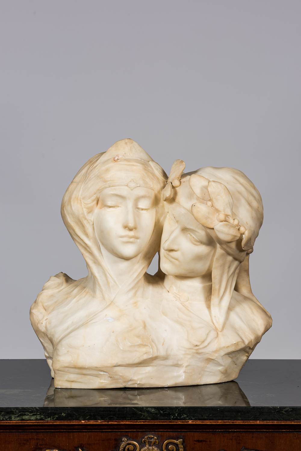 An Italian white marble sculpture of Dante Alighieri and his beloved Beatrice, ca. 1900