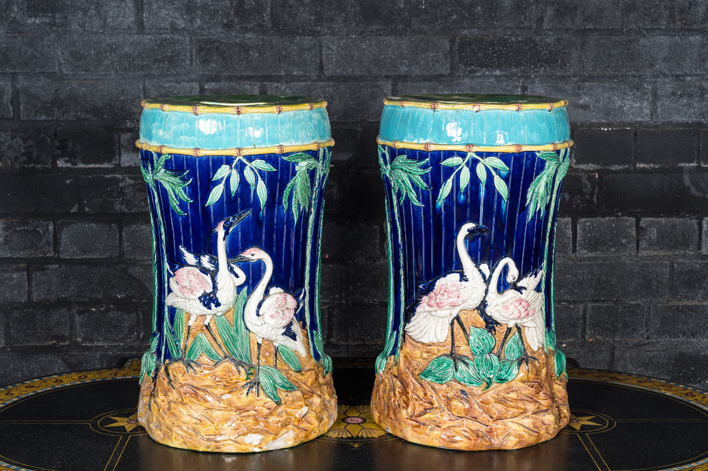 A pair of polychrome glazed jardini&egrave;re stands with flamingos, 20th C.