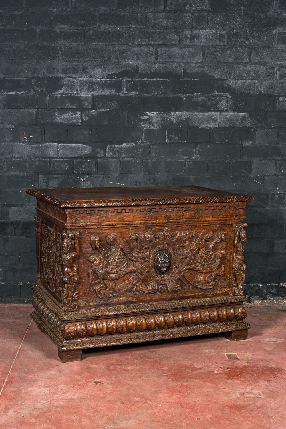 A Norman oak coffer with relief design, 16th C. and later