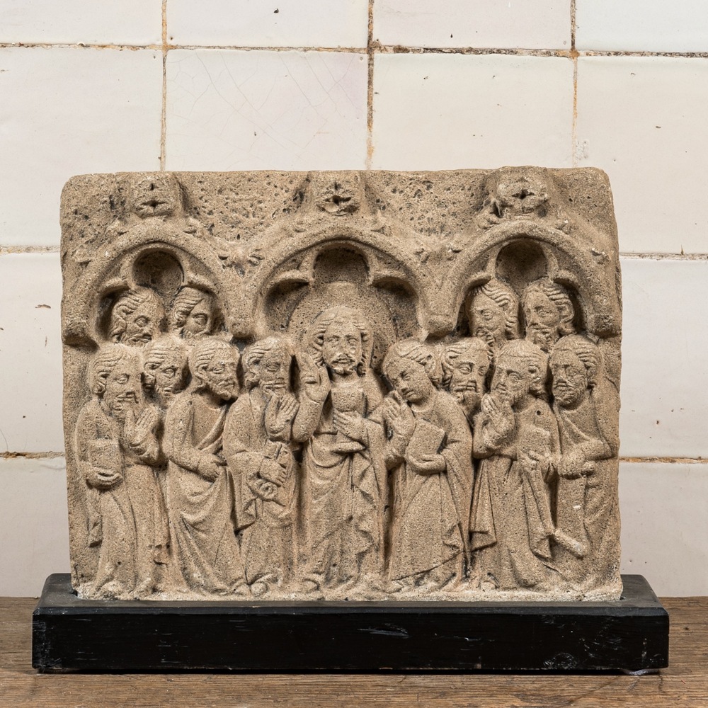 A sandstone relief depicting Christ and the twelve apostles, 20th C.