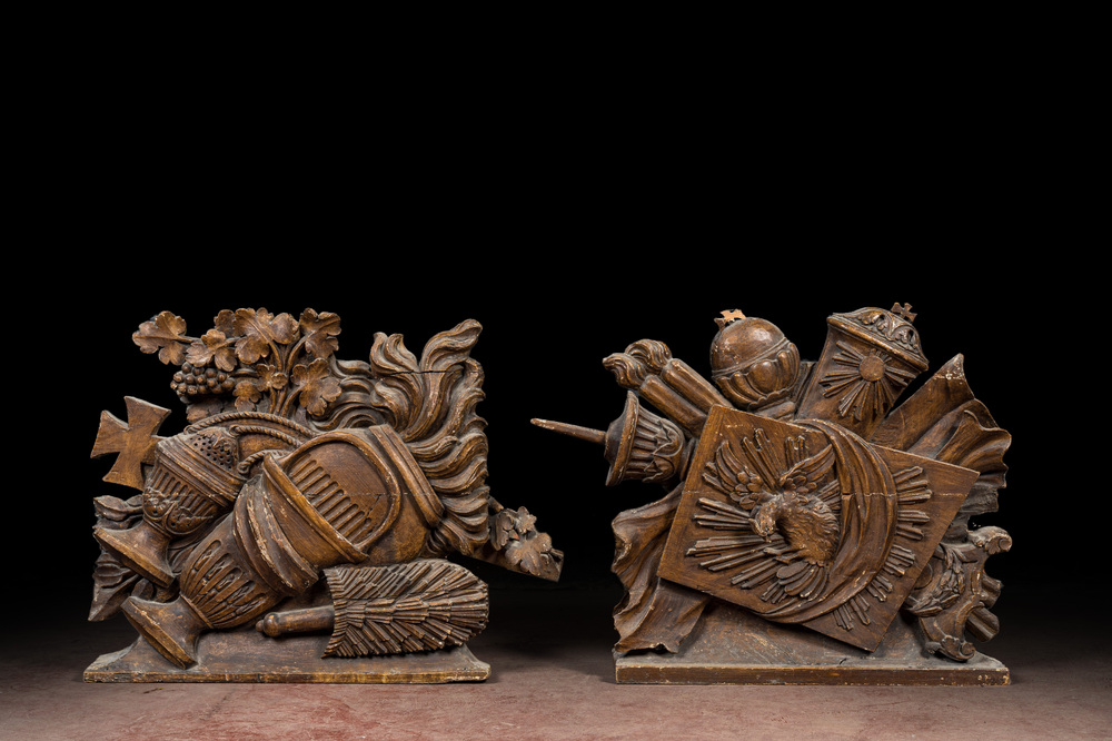 A pair of oak reliefs with Christian symbolism, 18th C.