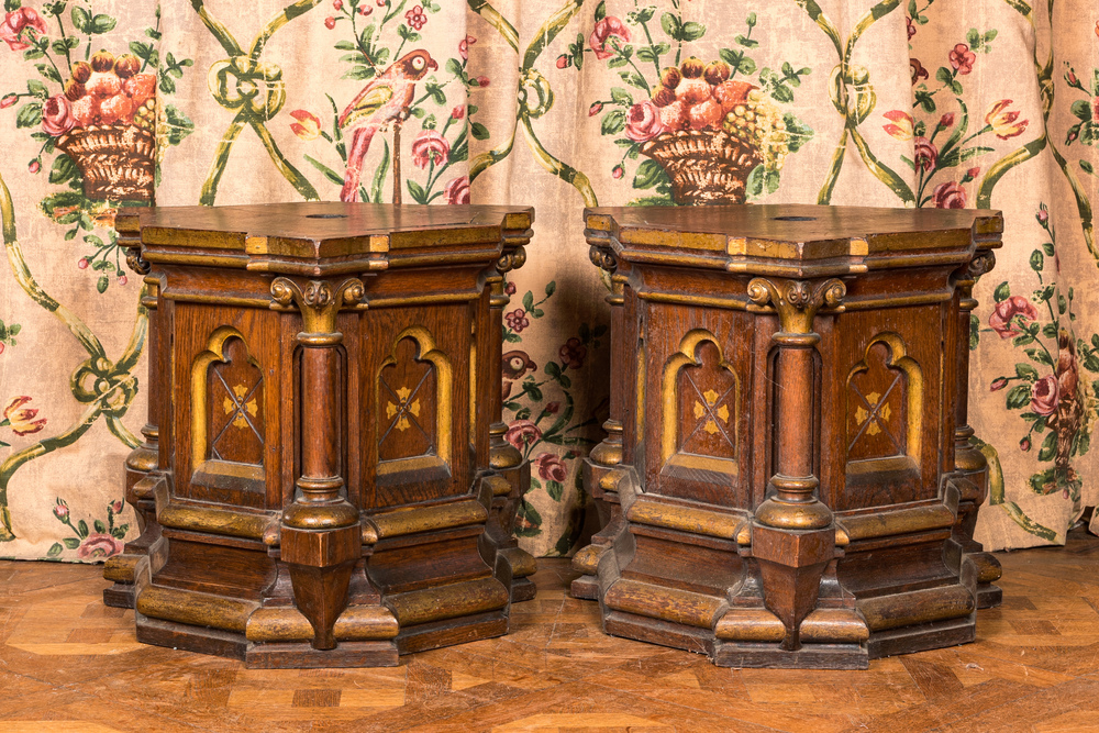 A pair of partly gilt wooden Gothic Revival stands, 19th C.