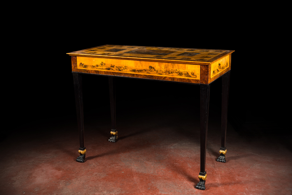 Een grote Russische Biedermeier consoletafel in notelaar met esdoornfineer met vnl. ruitersc&egrave;nes en opschrift 'Bogoslowsk', 19e eeuw