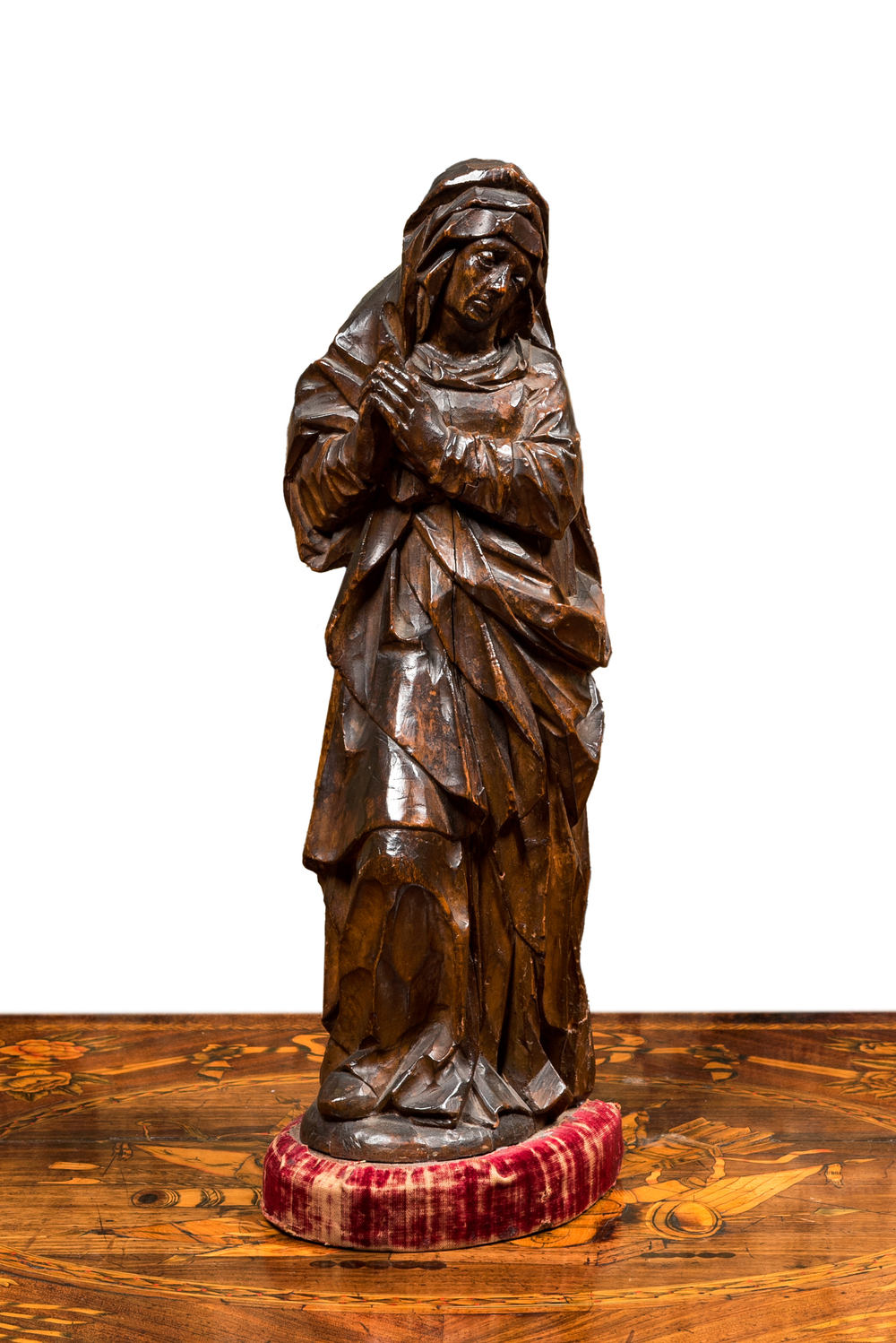 A walnut Virgin from a calvary, Southern Netherlands, 16th C.