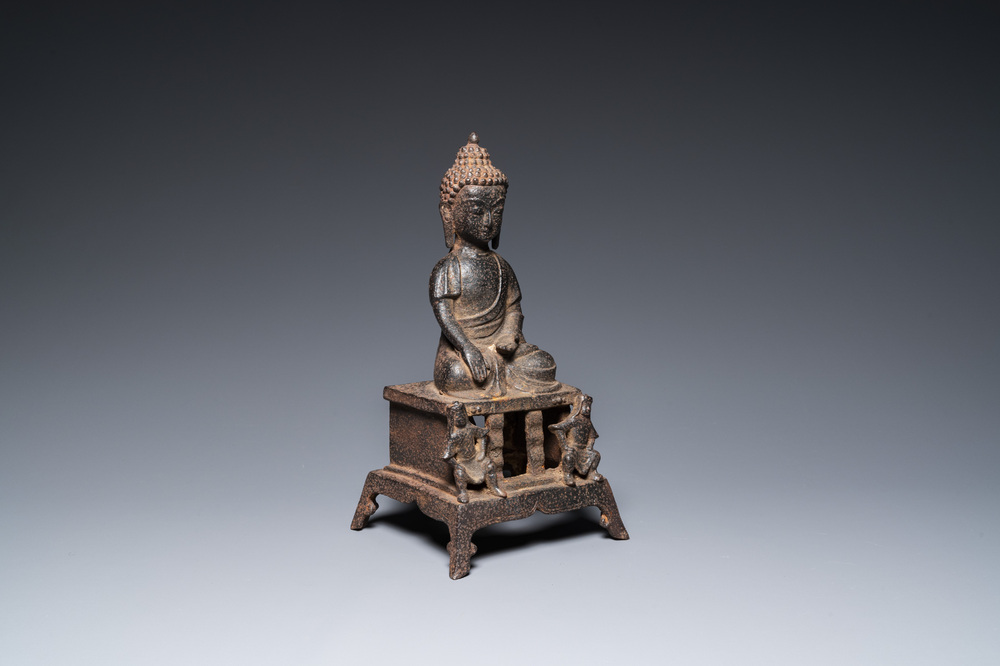 A large Chinese cast iron Buddha, Ming