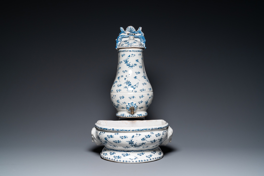 A blue and white Brussels faience fountain with basin, 18th C.