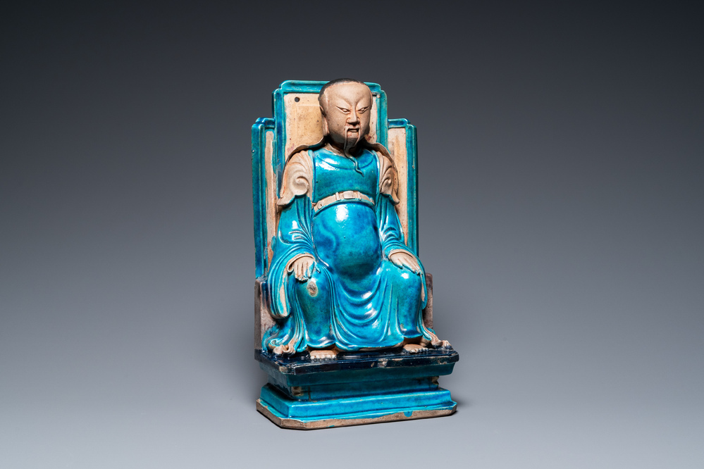 A Chinese fahua-glazed biscuit figure of Zhenwu, Ming