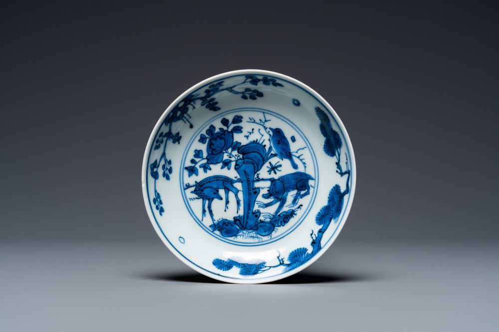 A Chinese blue and white 'monkey, deer and bird' plate, Xuande mark, Jiajing or Wanli