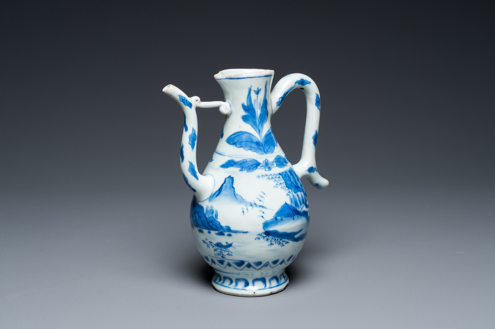 A Chinese blue and white ewer with a fisherman in a landscape, Transitional period