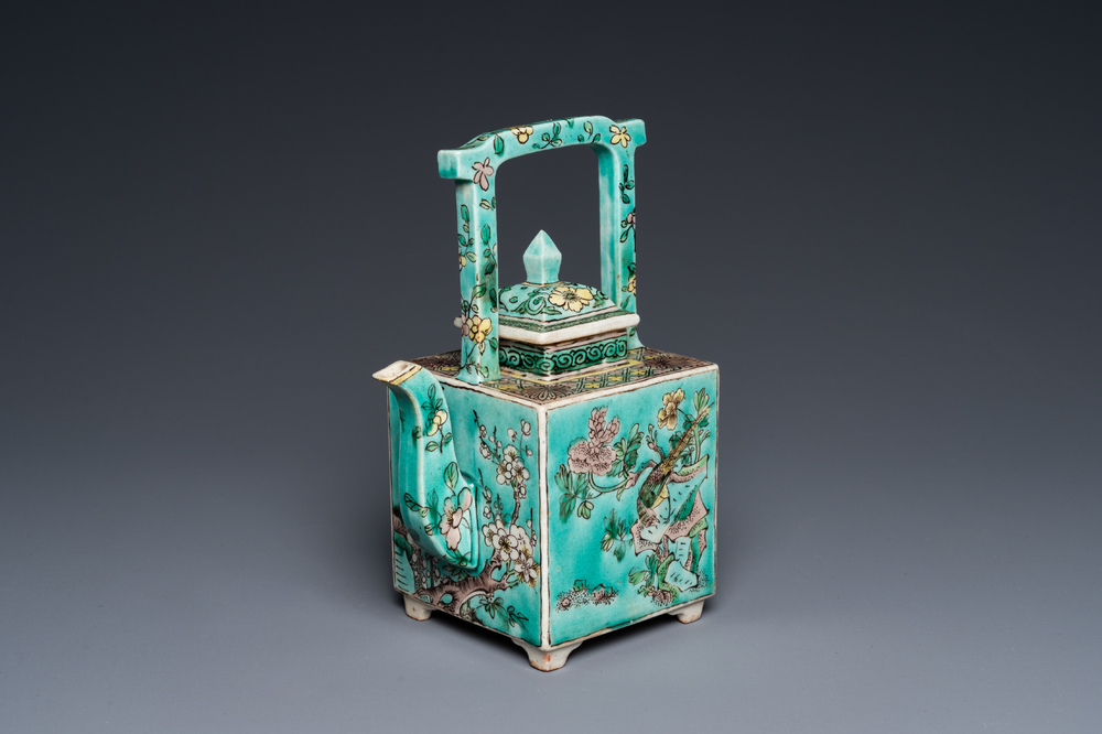 A square Chinese turquoise-ground verte biscuit teapot and cover, Kangxi