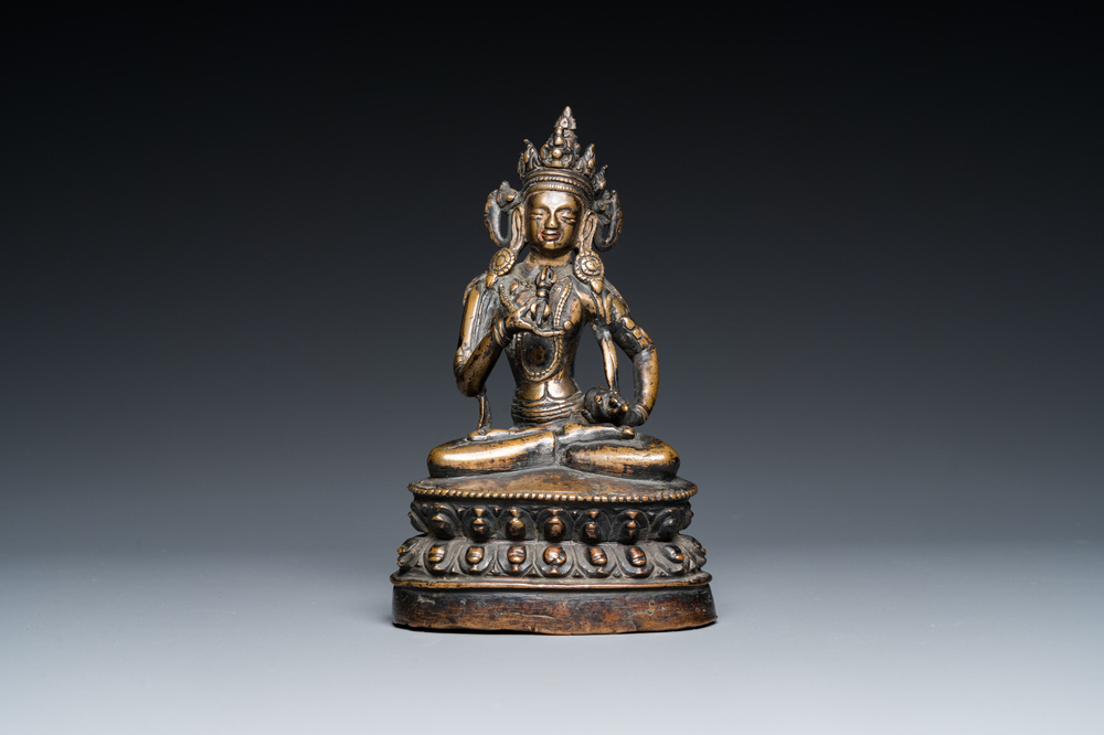 A Sino-Tibetan bronze Tara with vajra, 17th C.