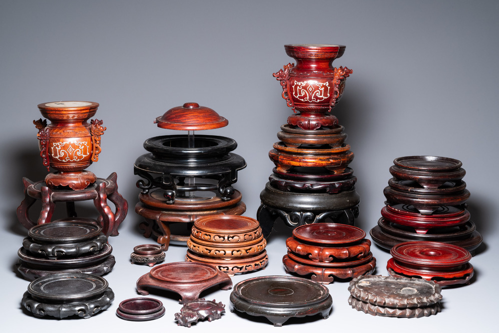 A varied collection of Chinese wooden stands, 19/20th C.