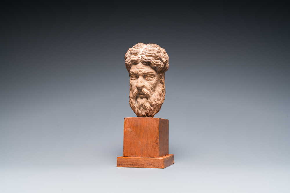 A carved stone head of a bearded man, 15/16th C.
