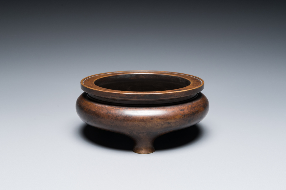 A Chinese bronze tripod censer, Xuande mark, Kangxi/Qianlong