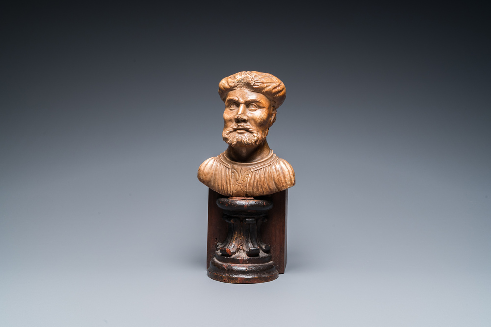 An Italian alabaster bust of a bearded man on a later wooden stand, 16th C.