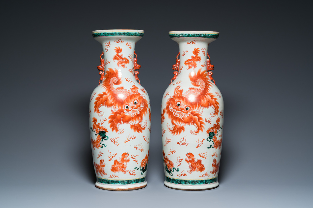 A pair of Chinese polychrome 'Buddhist lions' vases, 19th C.