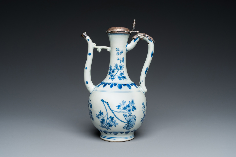 A Chinese blue and white silver-mounted ewer, Transitional period