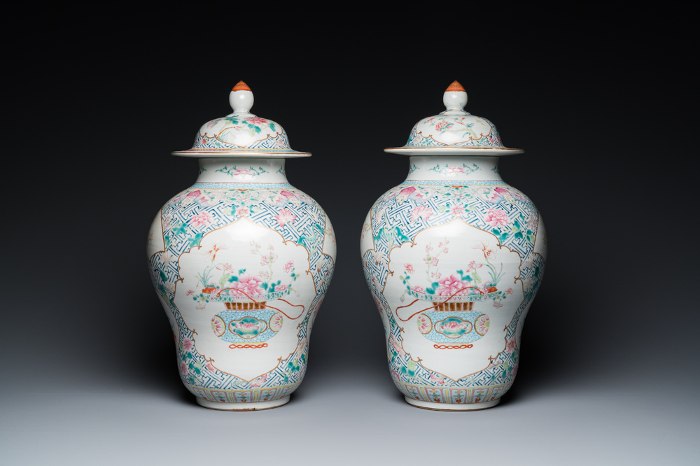 A pair of fine Chinese famille rose vases and covers, Qianlong mark, 19th C.