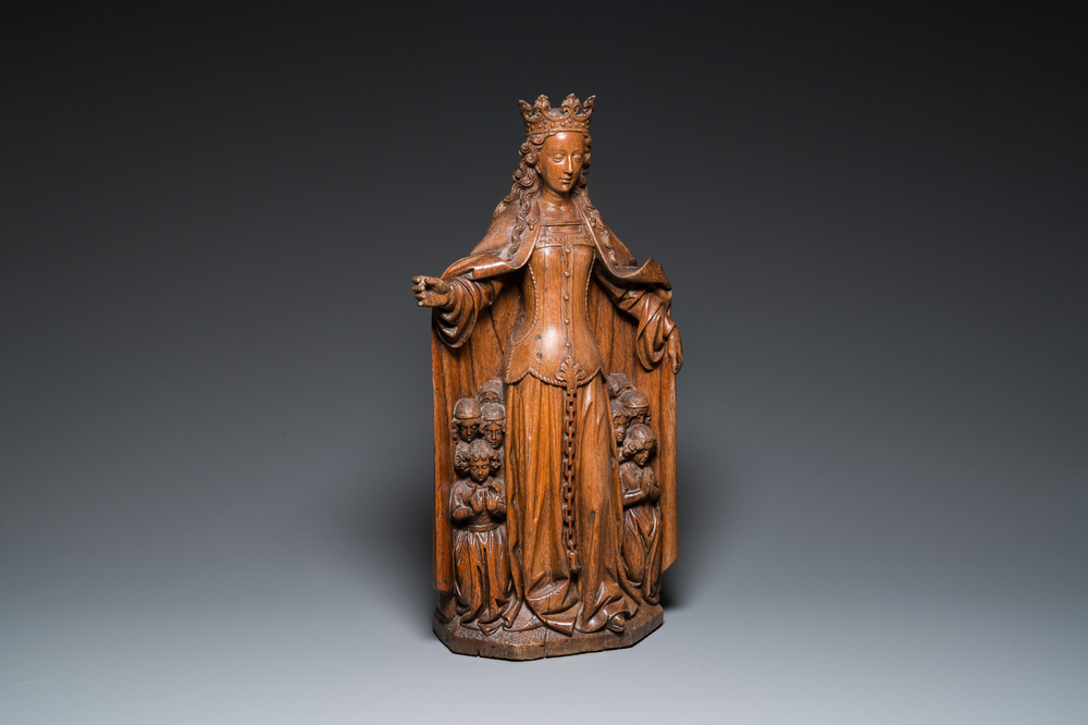 A large Flemish oak sculpture of Ursula with eight virgins, probably Malines, 16th C.