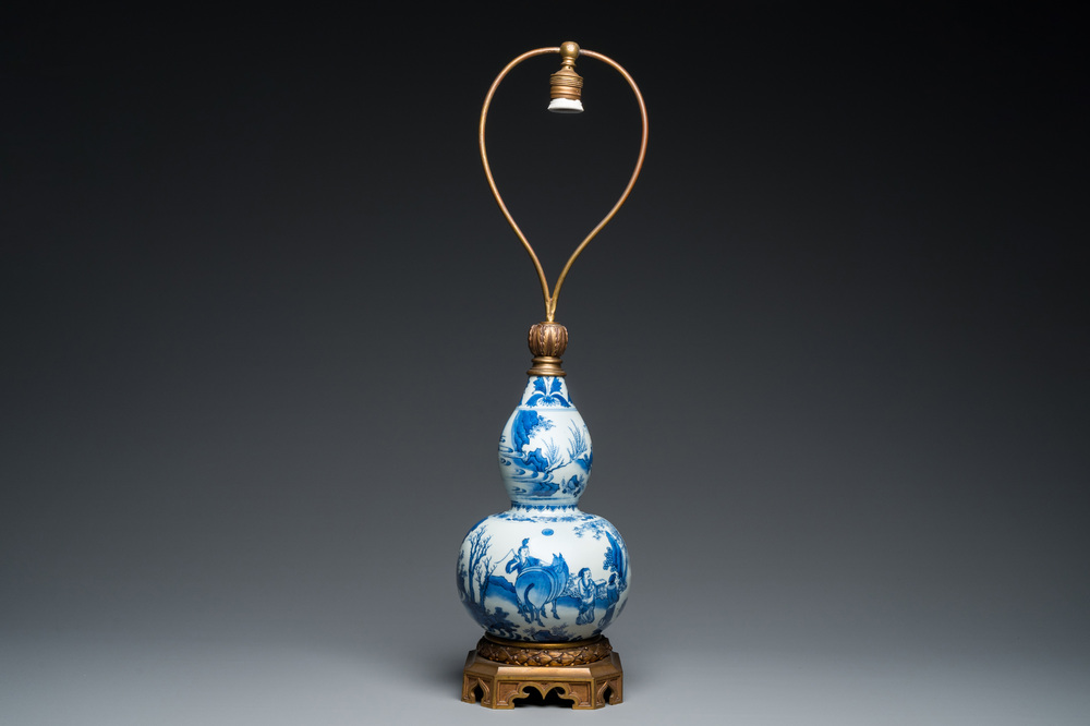 A Chinese blue and white double gourd vase mounted as a lamp, Transitional period