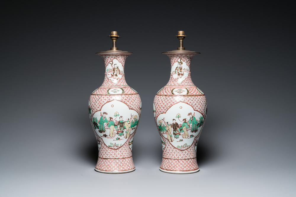 A pair of Chinese wucai vases with figurative design, 19th C.