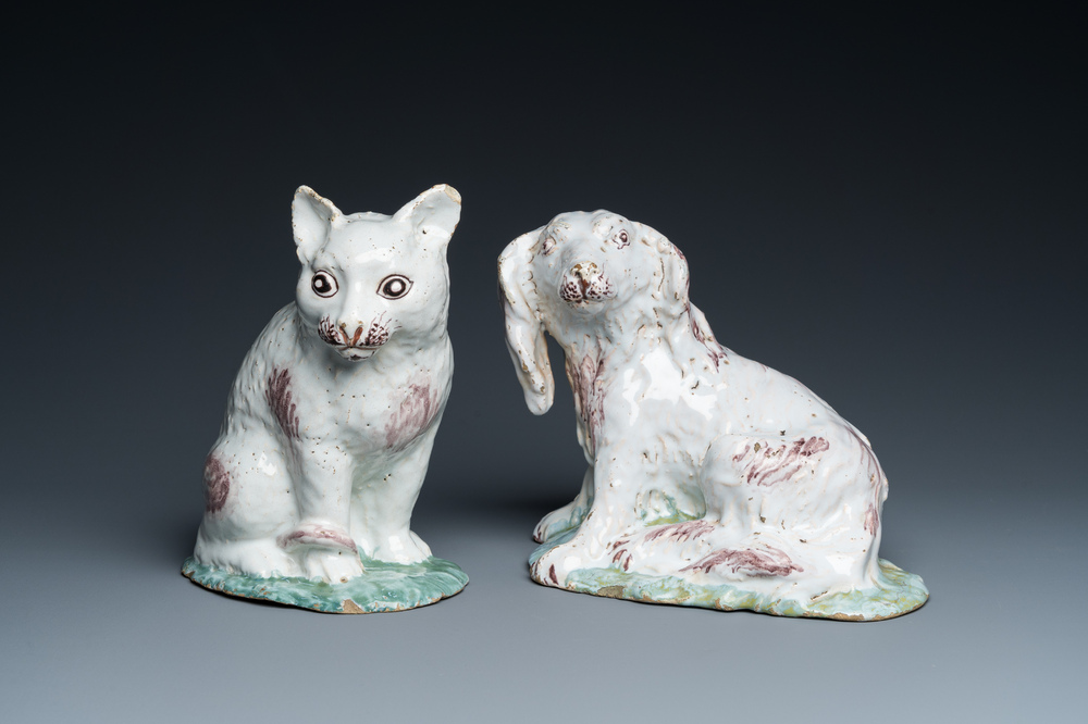 Two Brussels faience sculptures of a cat and a dog, probably Mombaers workshop, 2nd half 18th C.