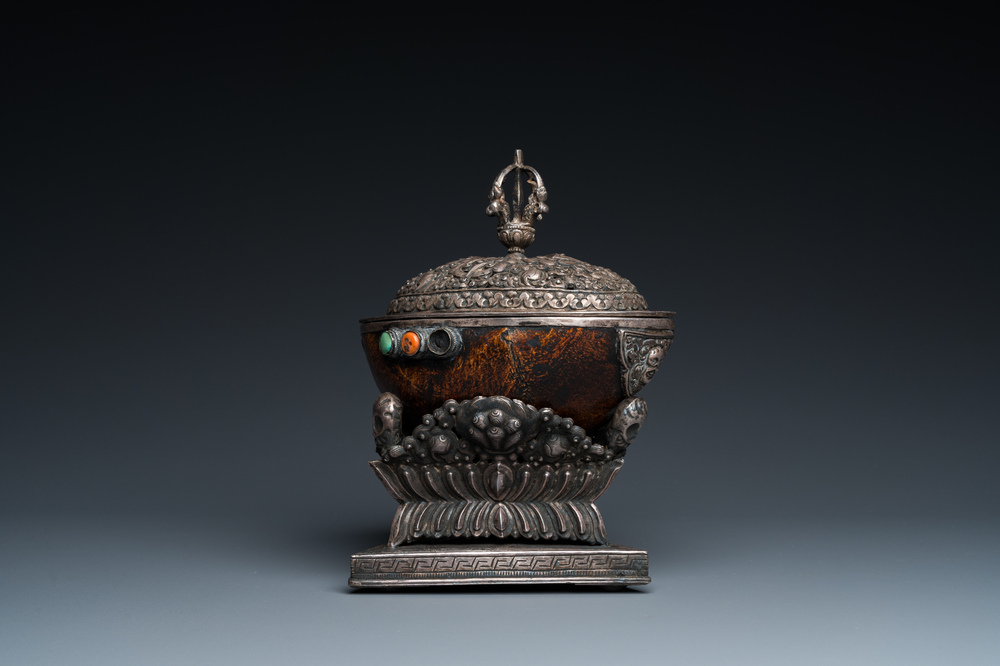 A Tibetan ritual silver-, coral- and turquoise-mounted 'kapala' or skull-bowl, 19th C.