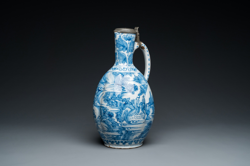 A large twisted Dutch Delft blue and white pewter-mounted ewer, 17th C.