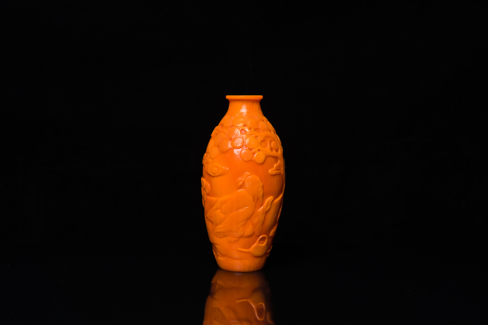 A Chinese orange Beijing glass 'scholars' vase, Yongzheng/Qianlong