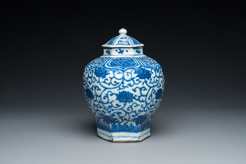 A Chinese hexagonal blue and white 'lotus scroll' vase and cover, Wanli