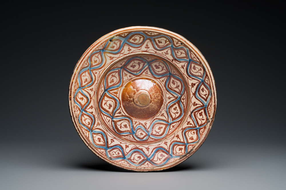 A large Hispano-Moresque lustre-glazed dish with ornamental design, Spain, 16th C.