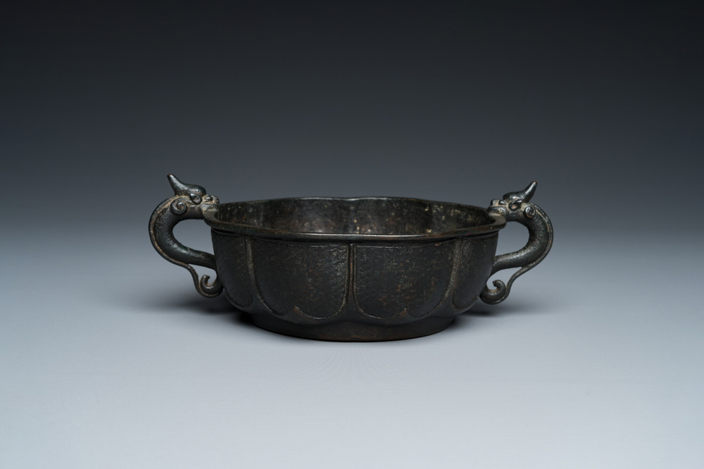 A Chinese archaistic bronze dragon-handled censer, Yuan