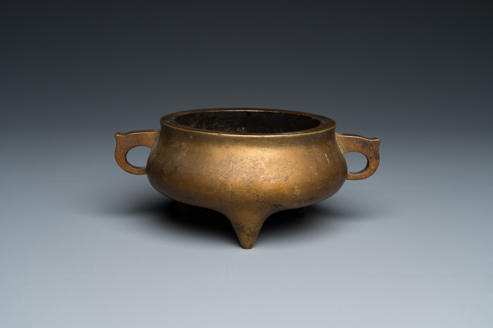 A Chinese bronze tripod censer, Xuande mark, 18th C.