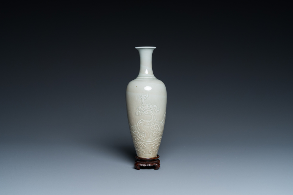 A Chinese celadon-glazed 'sea dragon' vase, Kangxi mark, 19/20th C.