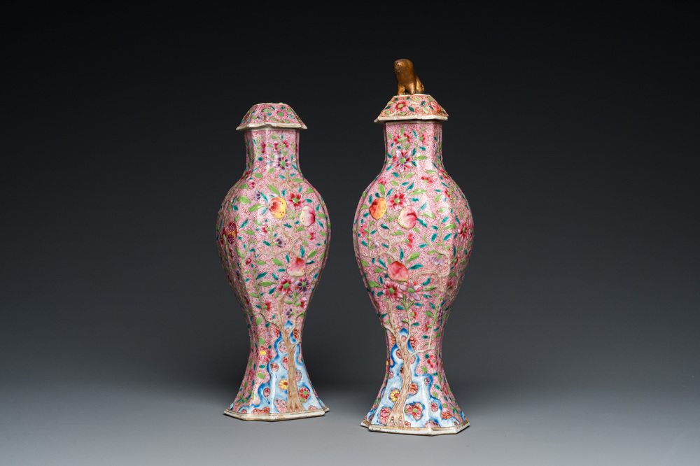 A pair of Chinese famille rose vases and covers, Yongzheng