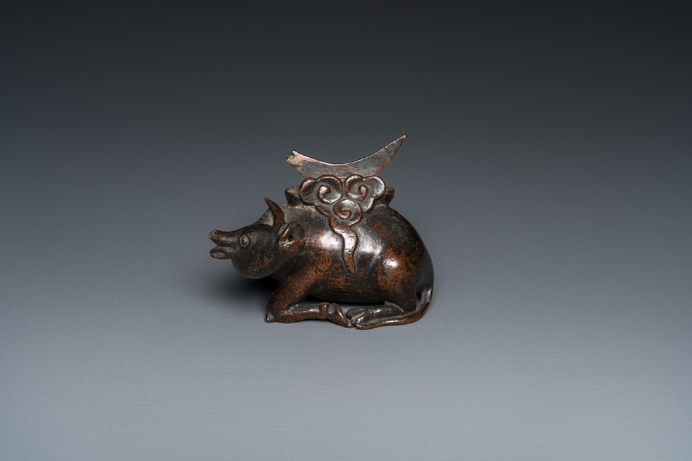 A Chinese bronze 'deer' mirror stand, late Ming