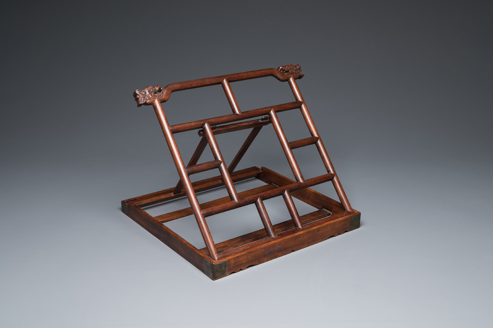 A Chinese foldable huali wooden book stand with brass mounts, Qing