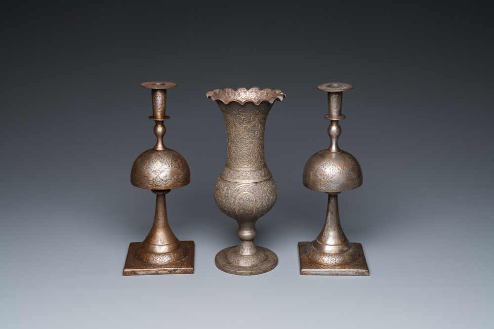 Une paire de bougeoirs et un vase en acier damascen&eacute;, art qadjar, la Perse, 19&egrave;me