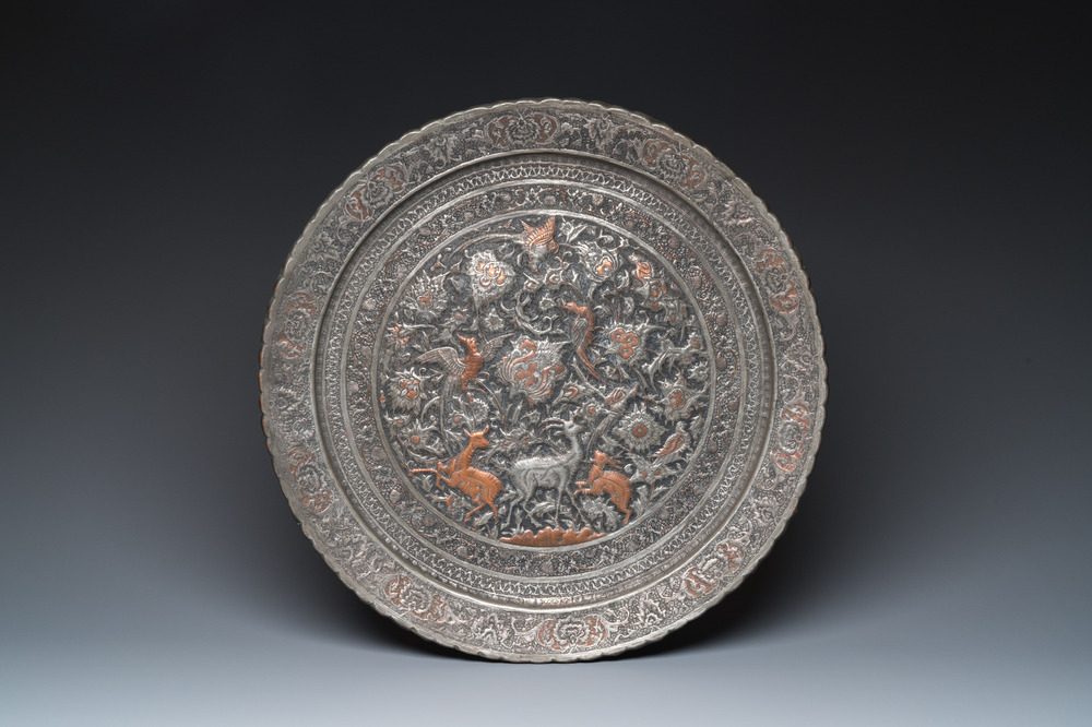 A large Islamic tinned copper 'goats and birds' dish, Qajar, 19th C.