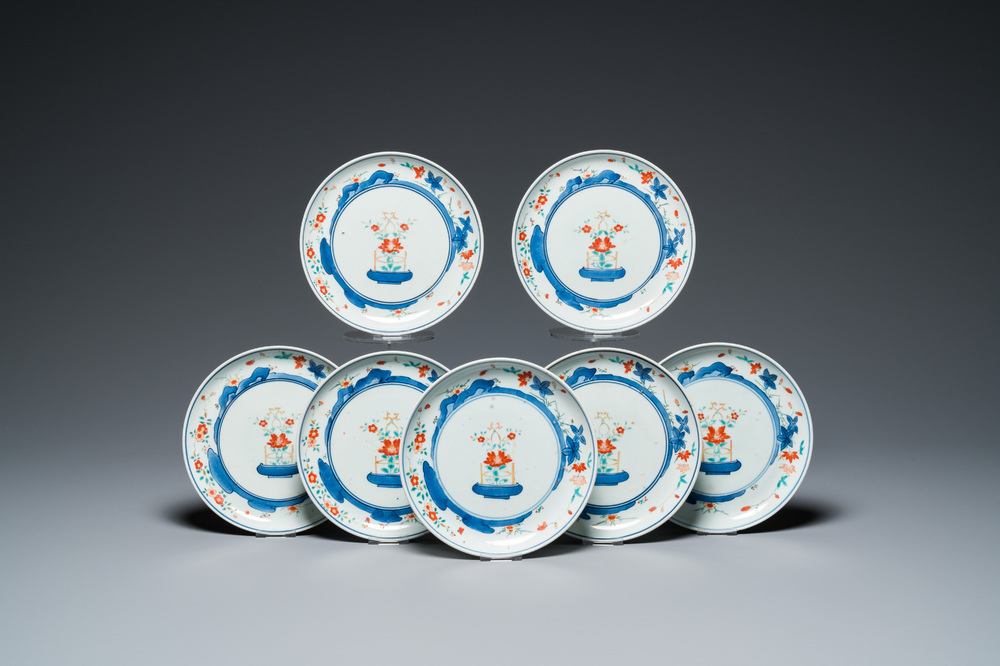 Seven Japanese Kakiemon-style plates with flower baskets, Chenghua mark, Edo, 17/18th C.